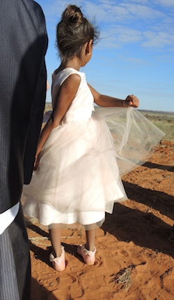 The couple's daughter loved swirling in her pretty dress