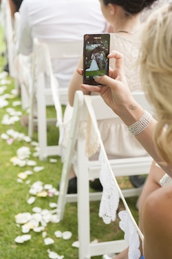 viewing a wedding through a pixelated screen 