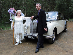 the couple chose a vintage car for their wedding